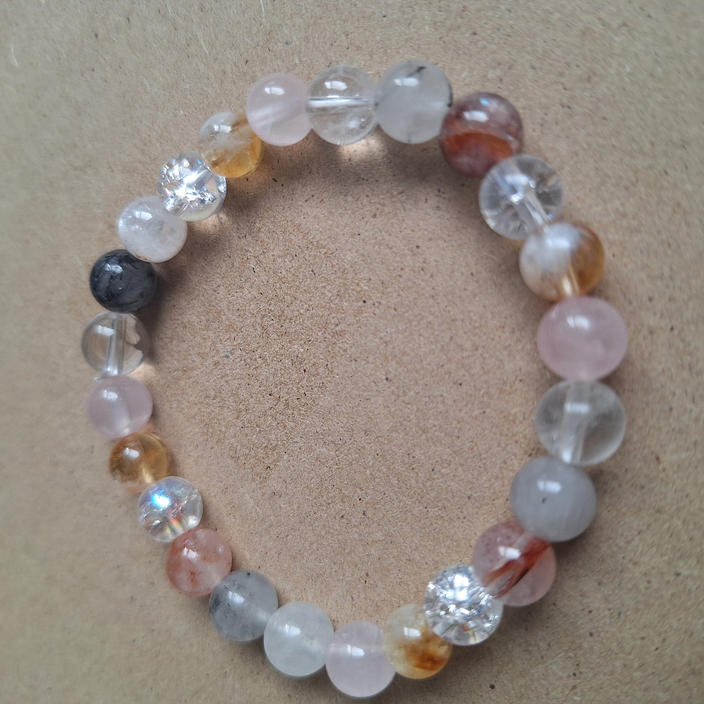 Master Healer Beaded Crystal bracelet with Clear Quartz, Rose Quartz, Rutilated Quartz, Hematoid Quartz and Cracked Quartz natural stone