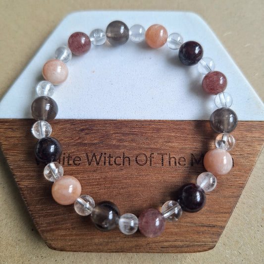 Tiredness bracelet gift for her crystal healing with Red Garnet, Clear Quartz, Moonstone, Smoky Quartz and Strawberry Quartz