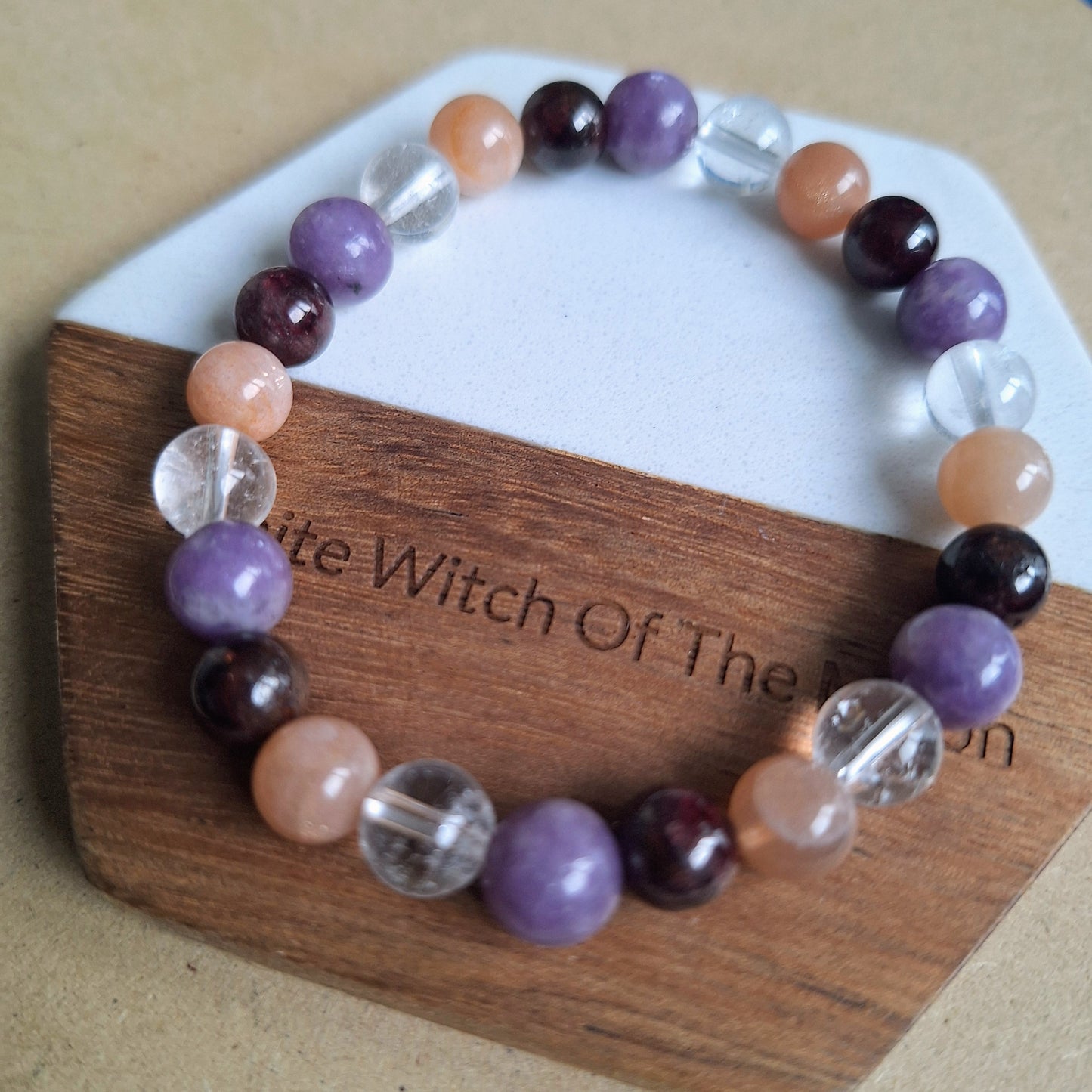 Menopause bracelet moonstone Garnet clear quartz and.lepidolite