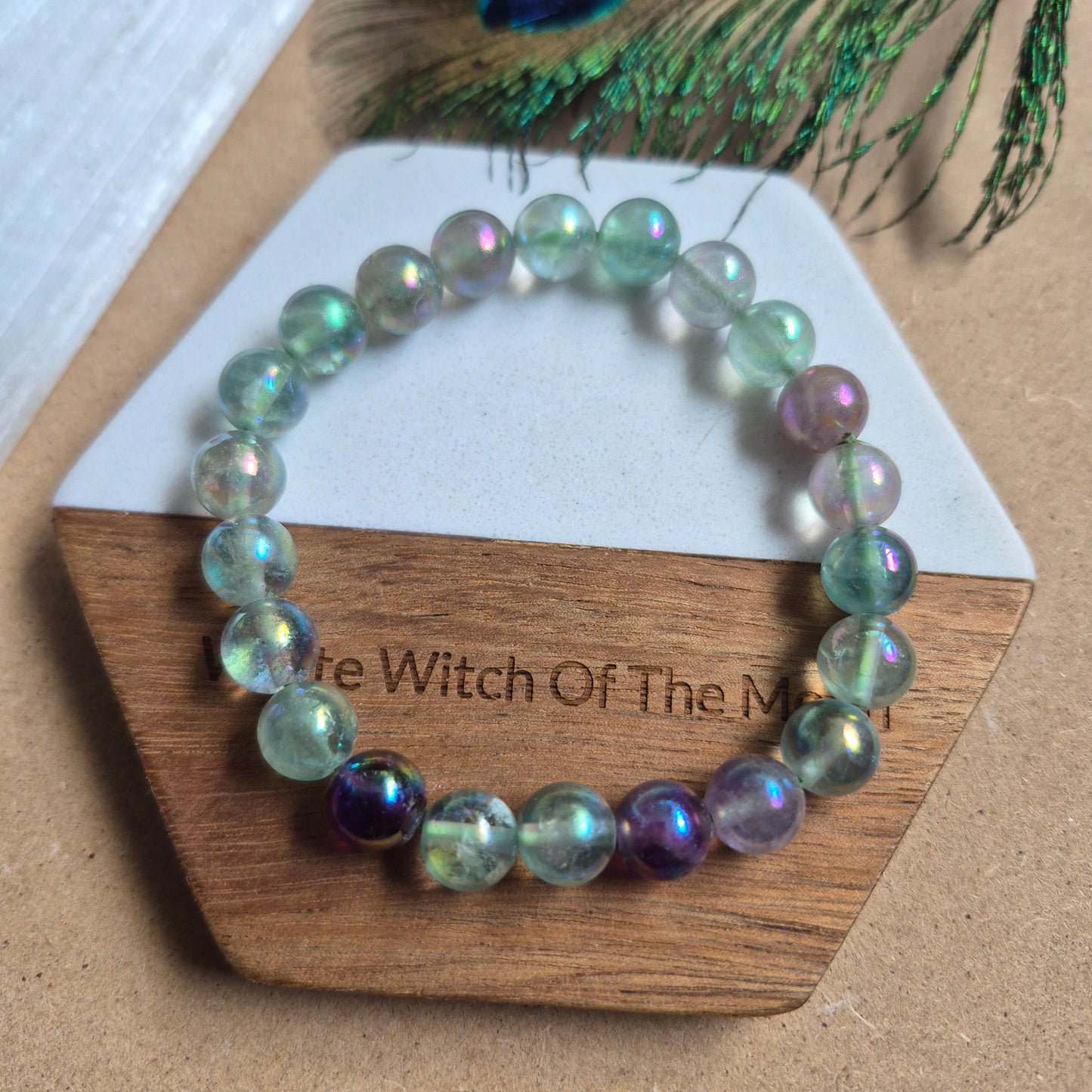 Fluorite with aura 8mm bead bracelet