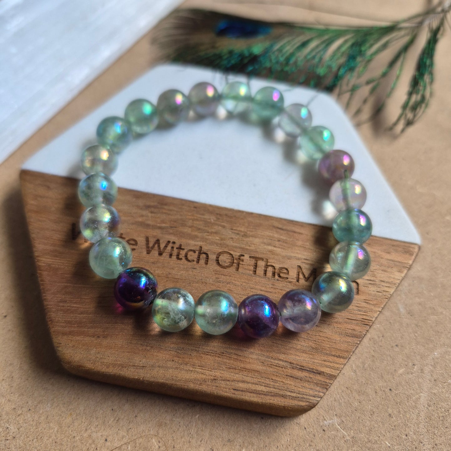 Fluorite with aura 8mm bead bracelet