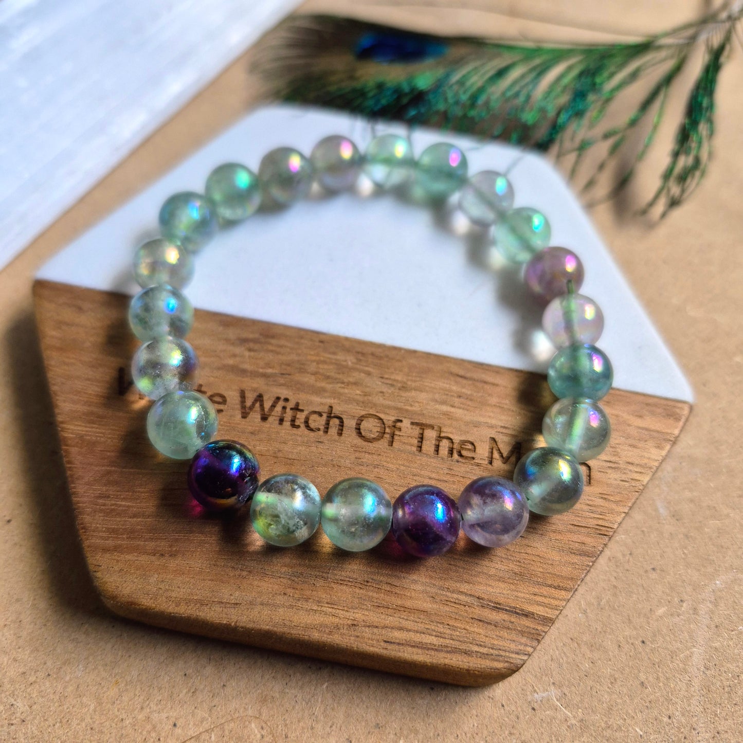 Fluorite with aura 8mm bead bracelet