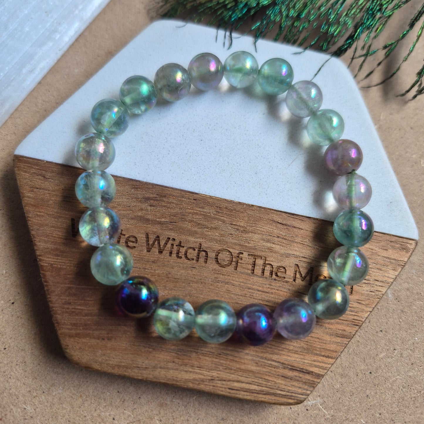 Fluorite with aura 8mm bead bracelet