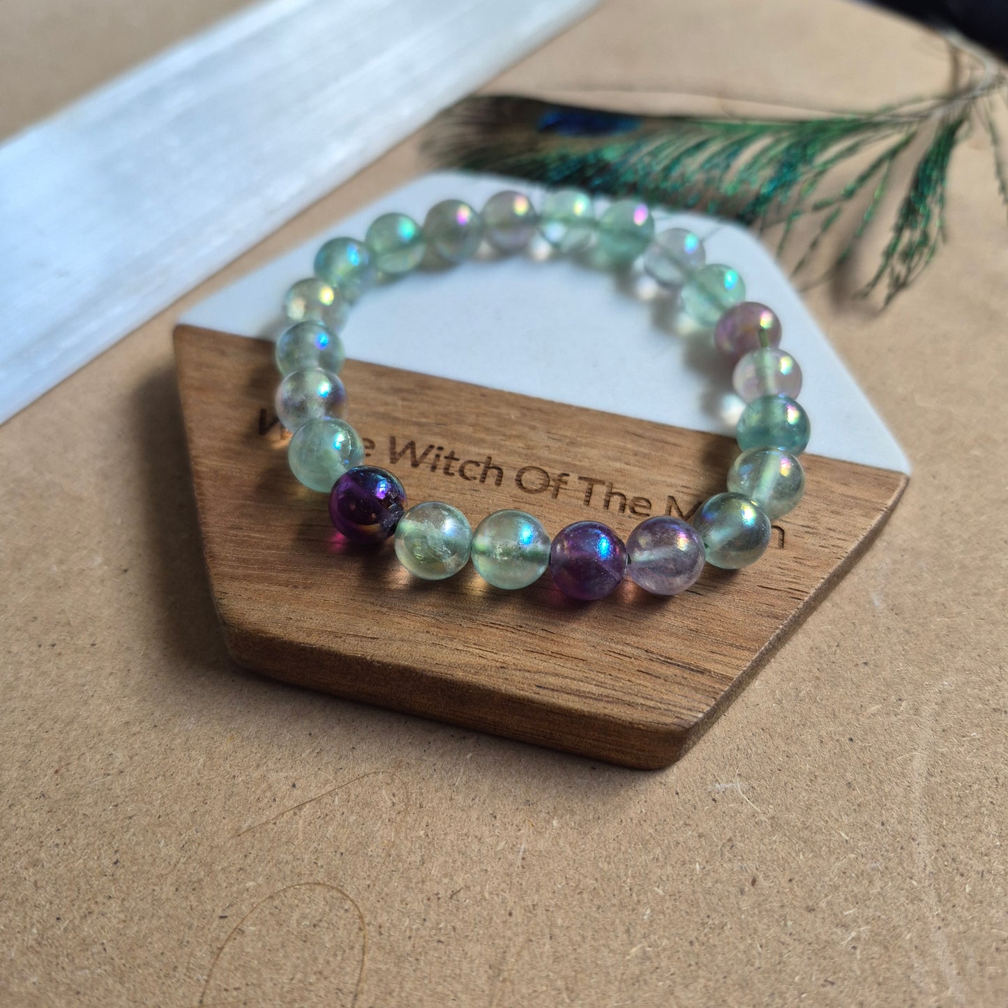 Fluorite with aura 8mm bead bracelet