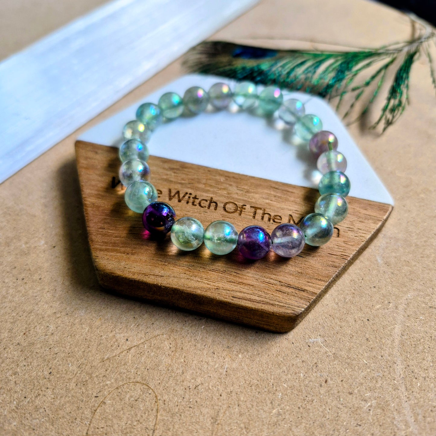 Fluorite with aura 8mm bead bracelet