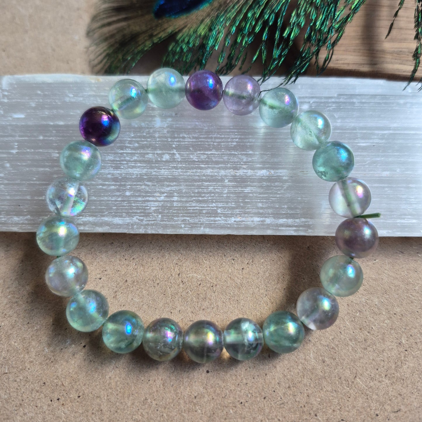 Fluorite with aura 8mm bead bracelet
