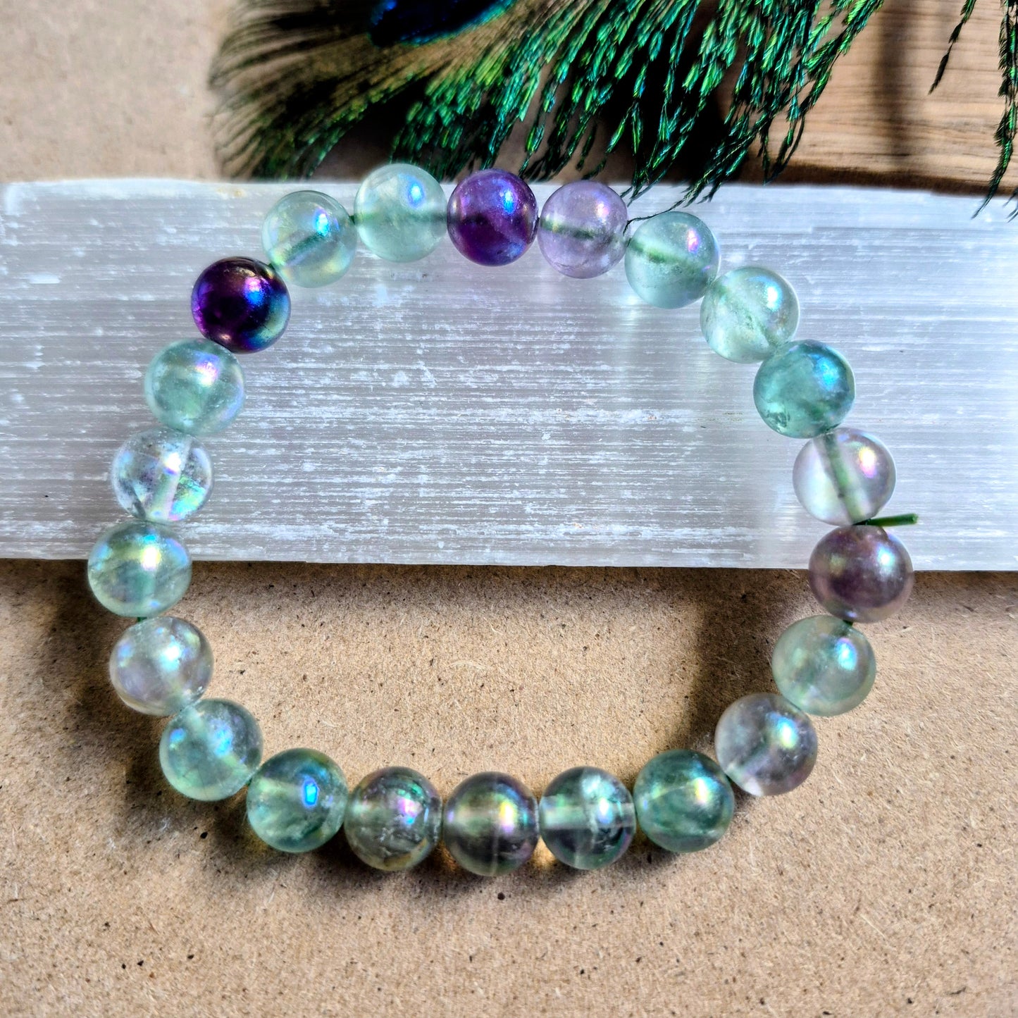 Fluorite with aura 8mm bead bracelet