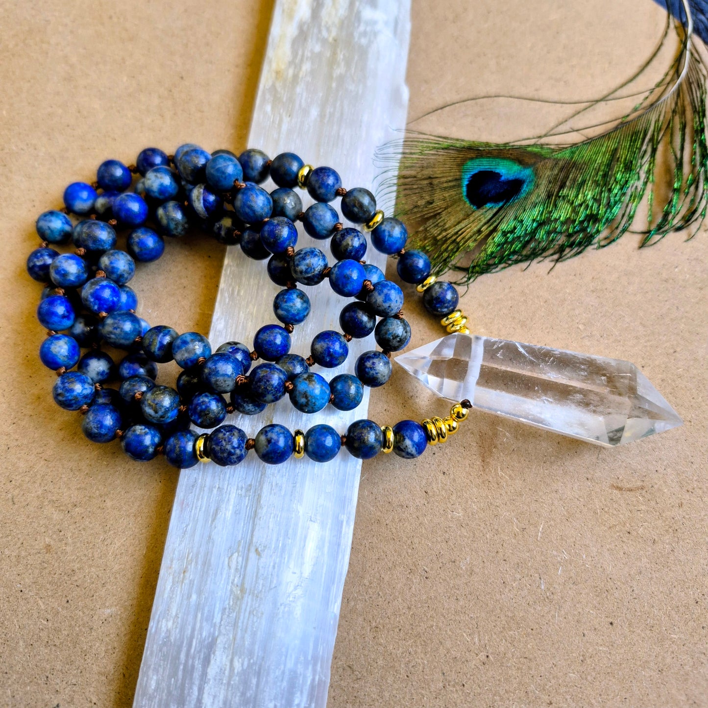 Lapis Lazuli knotted necklace with double terminated clear quartz Point