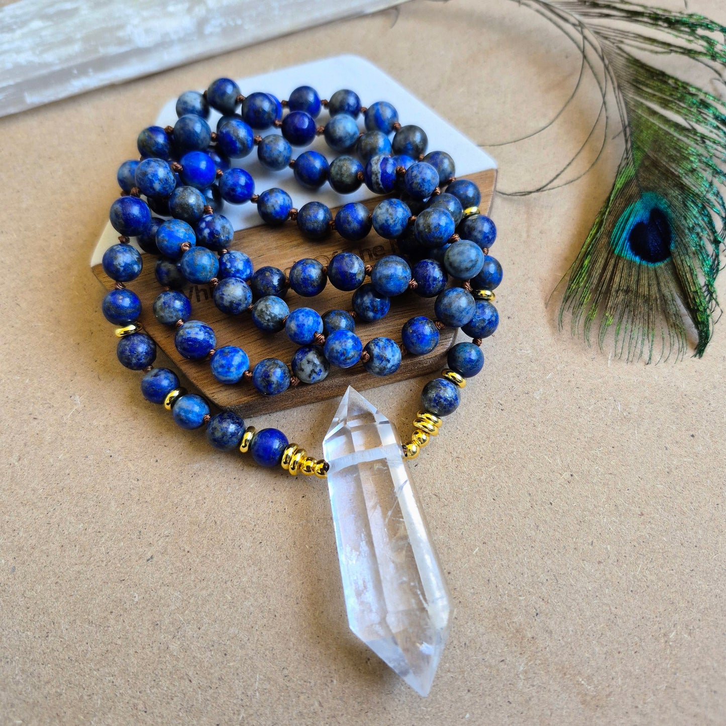 Lapis Lazuli knotted necklace with double terminated clear quartz Point