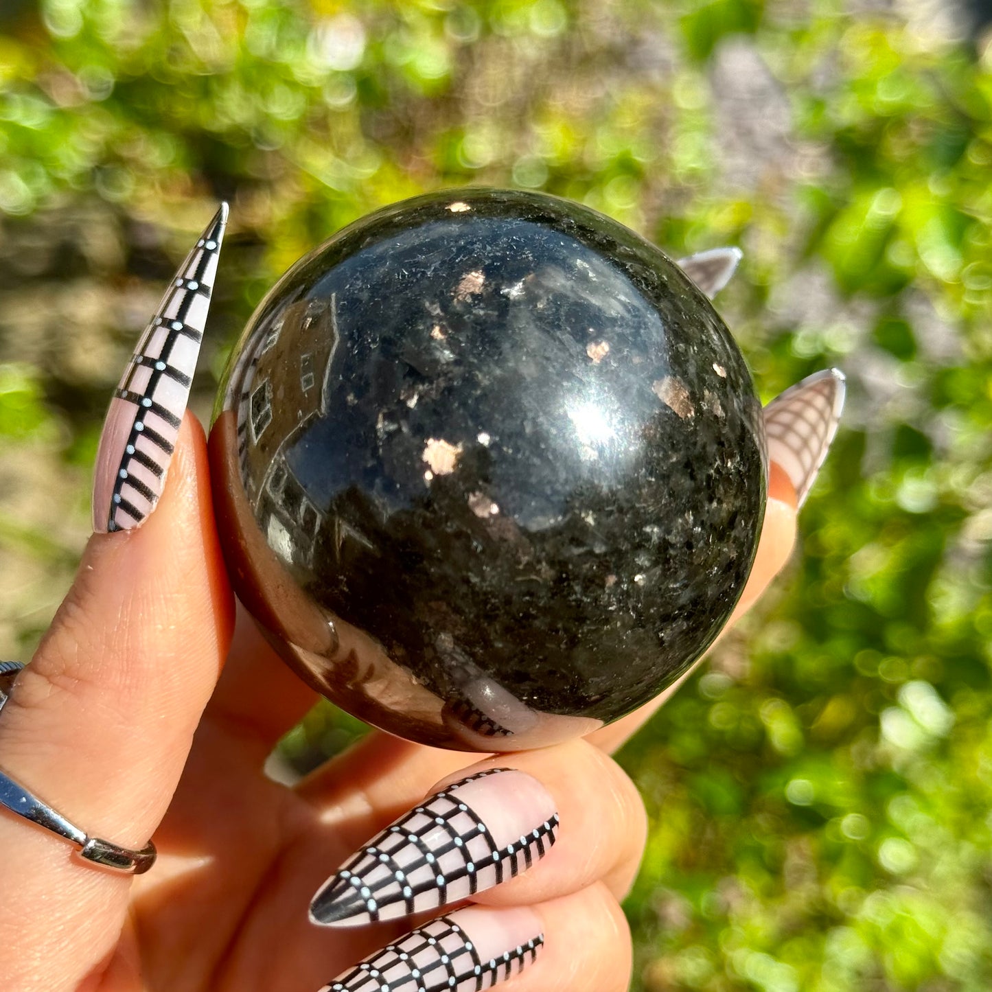 Coppernite (Indian Nuummite) 50mm Spheres With Gold Stand
