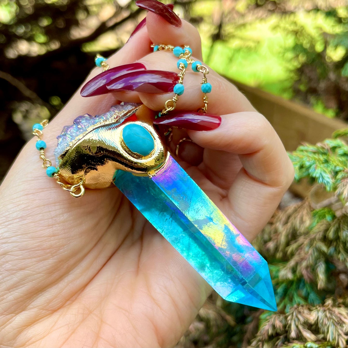 Aqua aura online quartz pendant